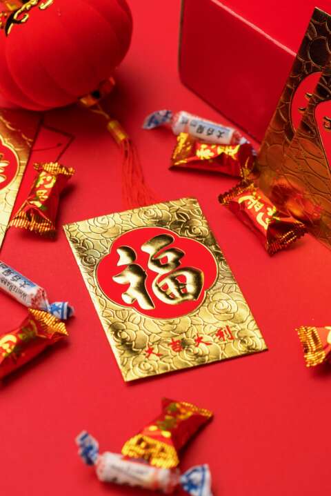 Neujahrsbräuche: chinesischer, roter Umschlag, Hongbao